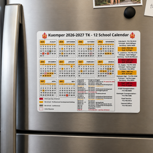 A refrigerator door displays a printed 12-month school calendar for Kuemper 2026-2027 TK. The calendar features a clean white background with yellow, orange, and red sections highlighting different months and school schedules, along with contact information for the school.